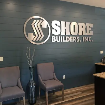 Sandblasted dimensional sign with raised lettering made by Cardinal Signs (example 12)